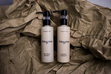 Load image into Gallery viewer, Pelegrims shampoo and conditioner editorial